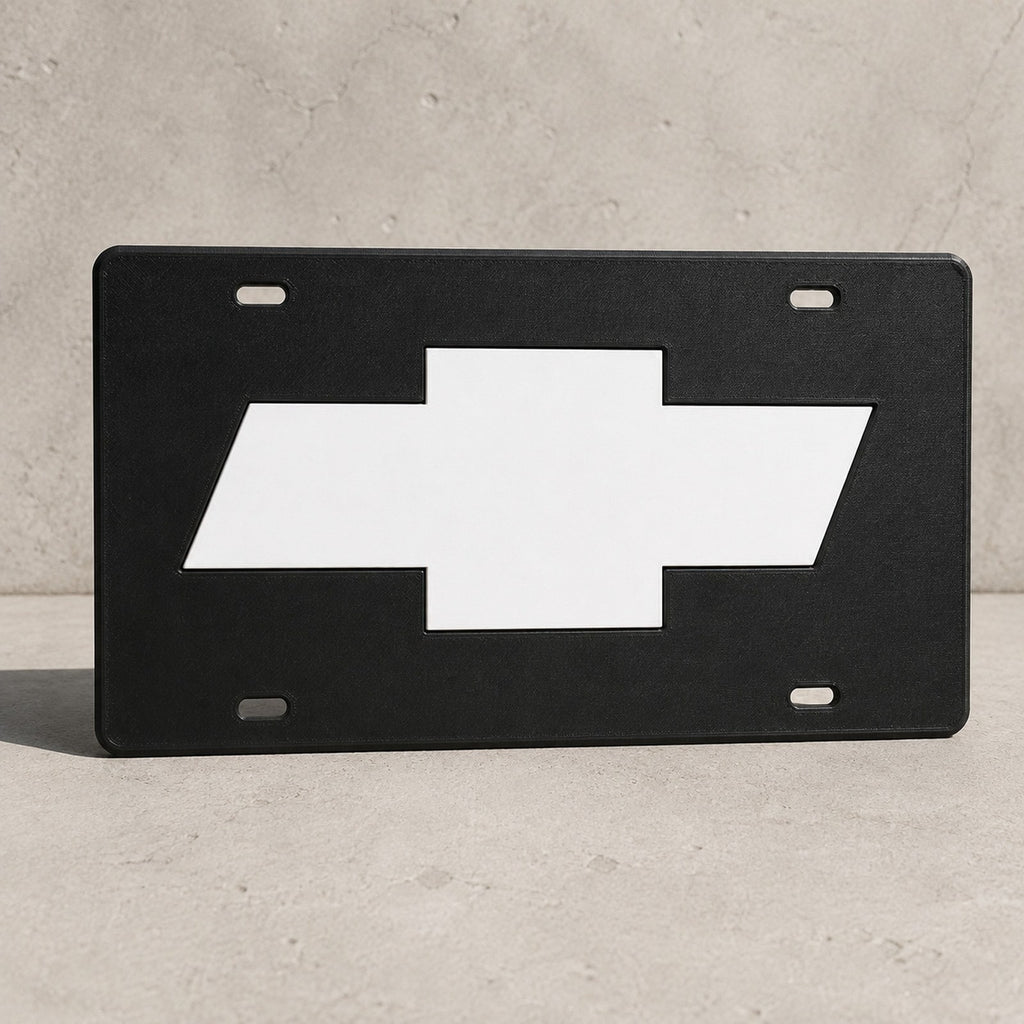 Chevy Black Face White Bowtie License Plate Car Tag 12x6 Slotted Front Novelty